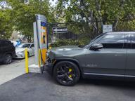 A Rivian R1T charging at a Chargepoint electric vehicle charging station in Chelsea in New York on Wednesday, May 1, 2024. ( Richard B. Levine