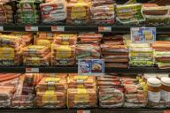Packages of various brands of hot dogs, including Oscar Mayer, are seen in a supermarket cooler in New York on Friday, July 1, 2022. ( Richard B. Levine