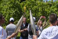 Francois Glories/MAXPPP - 11/05/2024 The Olympic Torch passes through Dignes les Bains. The Olympic Flame torchbearers will be taking the "Route Napoleon" on its 68-day journey across France before arriving in Paris on 26 July, the start date of 