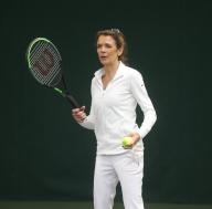 AFC Wimbledon team have a tennis lesson at the All England Club in Wimbledon from Annabel Croft , Monday 8th April 2024