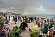 The revived tradition of Penzance May Horns takes place at dusk on Sunday, May 5, as people dressed in green and white blow horns and make noise from Newlyn to Penzance, following in the footsteps of the giant crow, Old Ned, to chase the devil of 