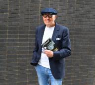 Paul Gregg, businessman and entertainment impresario, with his book, "Backstage Without a Pass". 9th May 2024
