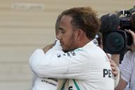 SUZUKA, JAPAN - OCTOBER 07: Lewis Hamilton, Mercedes AMG F1, 1st position, celebrates his win with his team mate Valtteri Bottas, Mercedes AMG F1 during the Japanese GP at Suzuka on October 07, 2018 in Suzuka, Japan. (Photo by Steve Etherington / LAT Images)