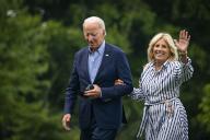 8/8/2022 - Washington, District of Columbia, United States of America: United States President Joe Biden and First Lady Jill Biden walk on the South Lawn of the White House after arriving on Marine One in Washington, D.C., US, on Monday, Aug. 8, 2022. Biden resumed official travel today for the first time since his bout with Covid-19, traveling to Kentucky to show federal support for the state