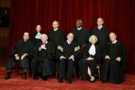 December 5, 2003 - Washington, DC, United States: The justices of the United States Supreme Court gather for a group portrait at the Supreme Court Building in Washington, DC. Traditionally, the justices pose for a group portrait only when there is a change. The court has not changed in nine years. Left to right in front row are: Associate Justice Antonin Scalia; Associate Justice John Paul Stevens; Chief Justice of the United States William Hubbs Rehnquist; Associate Justice Sandra Day O