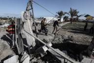Displaced Palestinians inspect their destroyed shelters following an overnight Israeli tanks shelling in the west of Khan Younis town southern Gaza Strip on, 10 March 2024. (Omar Ashtawy apaimages/APAImages/Polaris
