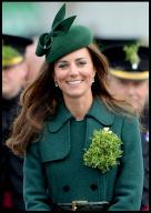 3/17/2014 - Aldershot, Hampshire, United Kingdom: The Duke and Duchess of Cambridge present traditional sprigs of shamrocks to mark St Patrick