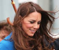 2/14/2014 - London, England, United Kingdom: The stormy weather blows the Duchess of Cambridge