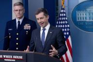 3\/27\/2024 - Washington, District of Columbia, United States of America: United States Secretary of Transportation Pete Buttigieg (R); and Deputy Commandant for Operations for the US Coast Guard, Vice Admiral Peter Gautier (L); participate in a news conference in the James Brady Press Briefing Room of the White House, in Washington, DC, USA, 27 March 2024. US Secretary of Transportation Pete Buttigieg and Deputy Commandant for Operations for the United States Coast Guard, Vice Admiral Peter Gautier, attended the news conference to discuss the collapse of the Francis Scott Key Memorial Bridge, which left six presumed dead after a cargo ship struck the bridge and destroyed it early on the 26th of March. (Michael Reynolds \/ CNP \/ Polaris