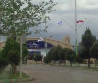 EXCLUSIVE: April 6, 2013 - Natanz, Iran: April, 2013 - Natanz, Iran: Natanz is the main uranium enrichment center in the Islamic Republic of Iran. This picture shows the new entrance building which has never been photographed be fore by a western journalist. It includes an administration building, and the cars parking lot for the plant\'s scientists and technicians. On the arch over the entrance, two portraits of the Ayatollah Khomeini, the founder of the Islamic Republic and some of his sayings. (Metula\/Polaris