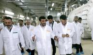 Iranian President Mahmoud Ahmadinejad visits the Natanz uranium enrichment facility at a desert site in the Isfahan province of Iran. The nuclear site has been the catalyst of the West\'s five-year standoff with Tehran over its program to enrich uranium. Tehran insists that the site is peaceful, turning natural uranium into fuel for nuclear power, while the US and western allies assert that Natanz\'s centrifuges are for enriching uranium into fuel for nuclear weapons