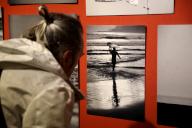 KYIV, UKRAINE - APRIL 23, 2024 - A visitor looks at the works of Ukrainian photographer Vera Blansh during the presentation of the Japan. Through Eyes and Heart exhibition at the Museum of the History of the City of Kyiv, Kyiv, capital of Ukraine.(Ukrinform\/POLARIS
