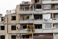 DNIPRO, UKRAINE - APRIL 25, 2024 - Workers dismantle a section of the apartment building at 118 Naberezhna Peremohy Street that was hit by the Russian Kh-22 missile on January 14, 2023, which killed 46 people, including 6 children, Dnipro, central Ukraine. (Ukrinform\/POLARIS