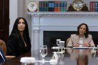 4/25/2024 - Washington, District of Columbia, United States of America: US media personality Kim Kardashian (L) attends an event on Second Chance Month with US Vice President Kamala Harris (R) in the Roosevelt Room of the White House in Washington, DC, USA, 25 April 2024. The White House issued a proclamation on Second Chance Month regarding efforts to give more than 650,000 people annually released from state and federal prisons in the United States âa fair shot at the American Dreamâ. (Michael Reynolds / CNP / Polaris