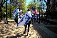 April 30, 2024- Chicago, Illinois, United States: Two dozen Israel supporters came to counter-protest the Palestinian encampment in DePaul University. They sang and danced while waiving the US and Israeli flags. The two groups did not come close to each other and performed their activity from a distance without any incident. Nima Taradji/Polaris