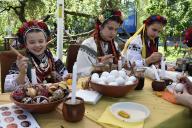 VINNYTSIA, UKRAINE - MAY 1, 2024 - Girls in Ukrainian national costumes make pysankas (Ukrainian Easter eggs) during the pre-Easter event Zapletemo Shuma at the Shchedryk creative space, Vinnytsia, west-central Ukraine. (Ukrinform\/POLARIS