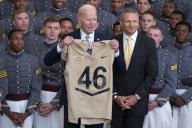 4\/5\/2024 - Washington, District of Columbia, United States of America: United States President Joe Biden receives a team jersey during the ceremony presenting the Commander-in-Chiefâs Trophy to the United States Military Academy Army Black Knights at the White House in Washington, DC, May 6, 2024. Looking on at right is head coach Jeff Monken. (Chris Kleponis \/ CNP \/ Polaris