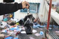 May 6, 2024 - Gaza: Palestinians salvage items from the debris of a container at an UNRWA school used to shelter displaced people, after it was hit in Israeli bombardment on Nusseirat in the central Gaza Strip on May 6, 2024. (Omar Ashtawy \/APAImages\/ Polaris