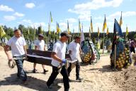 KYIV REGION, UKRAINE - MAY 10, 2024 - Men carry the coffin of the soldier Ivan Budnyk, who died on May 1 in Pokrovsk district, Donetsk region, as a result of mortar shelling, during a funeral ceremony on the Alley of Memory of the Defenders of Ukraine, Irpin, Kyiv region, northern Ukraine. (UKRINFORM/POLARIS