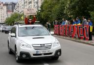 KYIV, UKRAINE - MAY 12, 2024 - A participant in a car holds a placard during the action in support of the captured defenders of Mariupol "Donât be silent! Captivity Kills" on Obolonska embankment, Kyiv, capital of Ukraine. (UKRINFORM/POLARIS