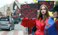 KYIV, UKRAINE - MAY 12, 2024 - Participants hold placards during the action in support of the captured defenders of Mariupol "Donât be silent! Captivity Kills" on Obolonska embankment, Kyiv, capital of Ukraine. (UKRINFORM/POLARIS