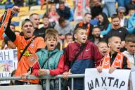 LVIV, UKRAINE - MAY 11, 2024 - Boys shout the 2023\/24 Ukrainian Premier League Matchday 28 game between FC Dynamo Kyiv and FC Shakhtar Donetsk at the Arena Lviv, Lviv, western Ukraine. The Miners have won the 2023\/24 Ukrainian Premier League title early with a seven-point gap and two rounds before the end of the championship due to the goal of Shakhtarâs midfielder Heorhii Sudakov in the 33rd minute. (Ukrinform\/POLARIS