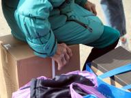 KHARKIV, UKRAINE - MAY 13, 2024 - The hand of an elderly woman rests on a box at a centre for people evacuated from Kharkiv region, Kharkiv, northeastern Ukraine. (Ukrinform/POLARIS