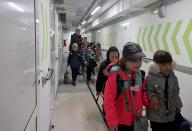 KHARKIV, UKRAINE - MAY 13, 2024 - Students are seen in the corridor at an underground school in Kharkiv, northeastern Ukraine. (Ukrinform/POLARIS