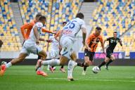 LVIV, UKRAINE - MAY 11, 2024 - Players of FC Dynamo Kyiv (white kit) and FC Shakhtar Donetsk (black and orange kit) are seen in action during the 2023/24 Ukrainian Premier League Matchday 28 game at the Arena Lviv, Lviv, western Ukraine. The Miners have won the 2023/24 Ukrainian Premier League title early with a seven-point gap and two rounds before the end of the championship due to the goal of Shakhtarâs midfielder Heorhii Sudakov in the 33rd minute. (Ukrinform/POLARIS