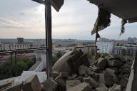 KHARKIV, UKRAINE - MAY 14, 2024 - A multi-story residential building damaged by Russian shelling, Kharkiv, northeastern Ukraine(Ukrinform\/POLARIS