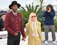 May 15, 2024 - Cannes, France: 77th International Cannes Film Festival / Festival de Cannes 2024. Day two. Rapper Baloji (left) and actress Emmanuelle Beart (right) during the photocall of the jury for the film festival award for the best debut feature film "Camera d