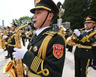 Working trip of Russian President Vladimir Putin to China. Musicians of a military orchestra during the official meeting ceremony between Russian President Vladimir Putin and Chinese President Xi Jinping at the Great Hall of the People on Tiananmen Square. 16.05.2024 China, Beijing (Peking) (Dmitry Azarov\/Kommersant\/POLARIS