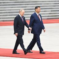 Working trip of Russian President Vladimir Putin to China. Russian President Vladimir Putin (left) and Chinese President Xi Jinping (right) during the official welcoming ceremony at the Great Hall of the People on Tiananmen Square. 16.05.2024 China, Beijing (Peking) (Dmitry Azarov\/Kommersant\/POLARIS