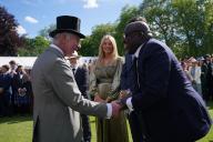 Image Licensed to i-Images / Polaris) Picture Agency. 15/05/2024. London, United Kingdom: King Charles III talking to Edward Enninful at a Buckingham Palace Garden Party in London. ( i-Images / Polaris) 