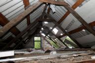 DNIPRO, UKRAINE - MAY 15, 2024 - The roof of a house is damaged by the falling debris of a Russian rocket, Dnipro, central Ukraine. (Mykola Miakshykov/Ukrinform / Polaris