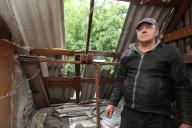 DNIPRO, UKRAINE - MAY 15, 2024 - A displaced man from Avdiivka, Donetsk region, is pictured in a house damaged by the falling debris of a Russian rocket, Dnipro, central Ukraine. (Mykola Miakshykov/Ukrinform / Polaris