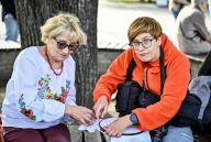 ZAPORIZHZHIA, UKRAINE - MAY 16, 2024 - A woman learns to embroider during the World Vyshyvanka Day celebration on Festyvalna Square, Zaporizhzhia, southeastern Ukraine. (UKRINFORM/POLARIS