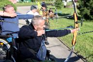 IVANO-FRANKIVSK, UKRAINE - MAY 16, 2024 - Servicemen who are being treated for their wounds attend an archery masterclass given by Kateryna Dubrovina, a Ukrainian archer who won a silver medal in the team competition at the 2000 Summer Olympics, Ivano-Frankivsk, western Ukraine. (Ukrinform/POLARIS
