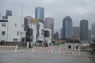 May 17, 2024 - Houston, Texas, United States: A storm system with torrential rainfall over East Texas spawned severe thunderstorms in Houston May 16 causing at least four fatalities and leaving more than 1 million customers without power with strong winds in excess of 70 mph caused most of the damage, toppling trees, blowing out windows of high-rise buildings and causing transmission towers holding power lines to crumble. (F. Carter Smith / Polaris