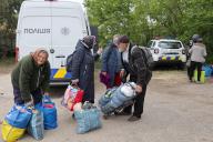 KHARKIV REGION, UKRAINE - MAY 17, 2024 - Elderly people are seen with their belongings during the evacuation from Vovchansk which is under constant Russian shelling, Kharkiv region, northeastern Ukraine. (Ukrinform/POLARIS