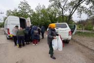 KHARKIV REGION, UKRAINE - MAY 17, 2024 - People are seen during the evacuation from Vovchansk which is under constant Russian shelling, Kharkiv region, northeastern Ukraine. (Ukrinform/POLARIS