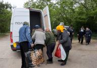 KHARKIV REGION, UKRAINE - MAY 17, 2024 - People are seen during the evacuation from Vovchansk which is under constant Russian shelling, Kharkiv region, northeastern Ukraine. (Ukrinform/POLARIS