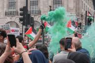 Image Licensed to i-Images \/ Polaris) Picture Agency. 18\/05\/2024. London, United Kingdom: Pro Palestinian March London. Pro Palestinian march starting at Portland Place with supporters of Israel counter protesting at Piccadilly Circus. (Martyn Wheatley \/ i-Images \/ Polaris