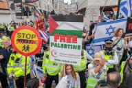 Image Licensed to i-Images / Polaris) Picture Agency. 18/05/2024. London, United Kingdom: Pro Palestinian March London. Pro Palestinian march starting at Portland Place with supporters of Israel counter protesting at Piccadilly Circus. (Martyn Wheatley / i-Images / Polaris