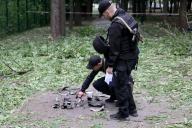 KHARKIV, UKRAINE - MAY 19, 2024 - Law enforcers collect the fragments of a Russian explosive found after shelling, Kharkiv, northeastern Ukraine. (UKRINFORM/POLARIS
