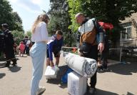 KHARKIV, UKRAINE - MAY 19, 2024 - People evacuated from the Kharkiv region get humanitarian aid at a centre, Kharkiv, northeastern Ukraine. (UKRINFORM/POLARIS