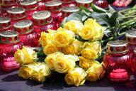 KYIV, UKRAINE - MAY 19, 2024 - Yellow roses and vigil lanterns are pictured at the Bykivnia Graves National Historical and Memorial Reserve on the Day of Remembrance of the Victims of Political Repressions, Kyiv, capital of Ukraine. (UKRINFORM/POLARIS