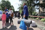 KHARKIV, UKRAINE - MAY 19, 2024 - People evacuated from the Kharkiv region get humanitarian aid at a centre, Kharkiv, northeastern Ukraine. (UKRINFORM/POLARIS