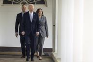 5/20/2024 - Washington, District of Columbia, United States of America: United States President Joe Biden walks along the colonnade with US Vice President Kamala Harris (right) and second gentleman Doug Emhoff (left) towards the Rose Garden for a reception celebrating Jewish American Heritage Month at the White House on May 20, 2024 in Washington, DC. The President reiterated his support for the Jewish people following the October 7th terrorist attacks. (Samuel Corum / CNP / Polaris