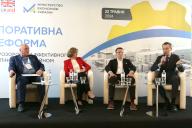 KYIV, UKRAINE - MAY 22, 2024 - Moderator, head for Corporate Management at the USAID/UKaid funded State-Owned Enterprises Reform Activity (SOERA) Vadym Gruzyn, Deputy Head of the EBRD in Ukraine Irina Kravchenko, Deputy Chair of the Verkhovna Rada Committee on Economic Development Oleksii Movchan and Deputy Minister of Economy of Ukraine for Digital Development, Digital Transformations and Digitalization Oleksii Sobolev (L to R) attend the Corporate Reform: The Way to Transparent and Effective State Property Management Conference in Kyiv, capital of Ukraine. (UKRINFORM/POLARIS